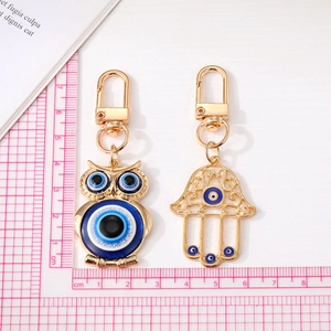 Set portachiavi Occhio del Diavolo a forma di gufo e mano di Fatima in lega oro