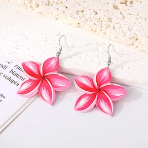 Pink acrylic floral earrings with summer style petals on a minimalist stone background