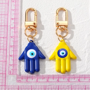 Llavero de Mano de Fátima y Ojo Turco en aleación azul y amarillo con regla de medida