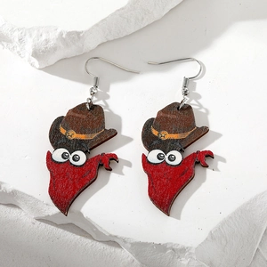 Detailed view of handmade wooden earrings featuring cute cartoon cowboy cat design patterns