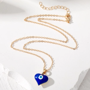 Collana dorata con pendente a cuore blu macaron e occhio del diavolo su pietra