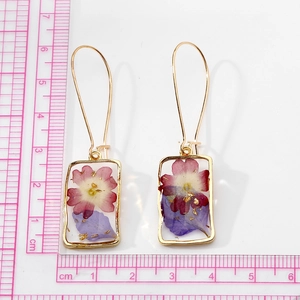 Handmade gold square resin earrings with real pink dried flowers and gold foil