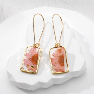 Handmade gold square resin earrings with real pink dried flowers and gold foil accents
