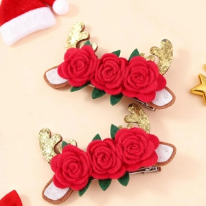 Weihnachts-Haarspangen mit glitzerndem Geweih und roten Rosen für festliche Frisuren