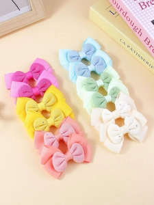 Détail des barrettes à cheveux en ruban double couche avec strass scintillants