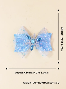 Dimensions détaillées du nœud à cheveux en tulle bleu avec flocon et strass