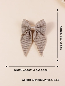 Detailed size specifications for champagne gold pleated fabric bow hair clip with long tails