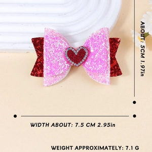 Fermaglio a fiocco rosa glitterato con cuore di strass rossi e misura di 7,5 cm di larghezza