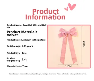 Detail view of pink velvet ribbon hair bow with clear texture and 11x22cm dimensions