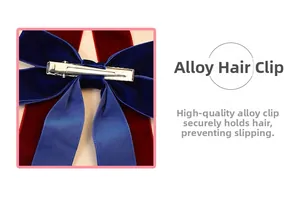 Detail view of durable silver alloy alligator clip on velvet bicolor bow hair accessory