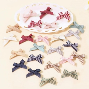Set of handmade colorful grosgrain ribbon bow hair clips for girls in various patterns