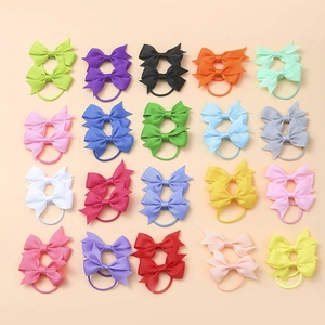 Detail view of colorful ribbed grosgrain ribbon bow hair ties in a 40-piece assorted set