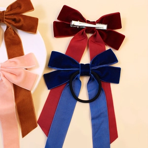 Velvet ribbon hair bows with long tails and elastic bands in multiple colors