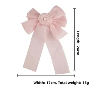 Pink ribbon bow hair clip with satin rose and pearls detail, size 24cm by 17cm