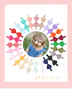 Detailed view of 20 colors of elastic nylon bow headbands for baby girls and infants
