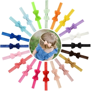Set of 20 colors elastic nylon baby bow headbands arranged in a radial pattern on white background