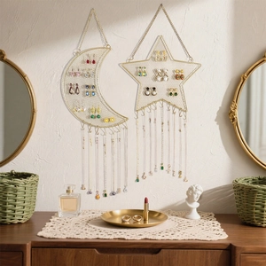 Star and moon shape gold jewelry wall organizer with grid mesh and hanging hooks