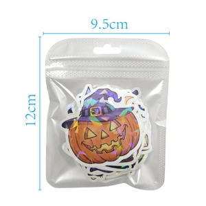 Detail view of laser Halloween sticker set showing pumpkin wizard and 12x9.5cm packaging size