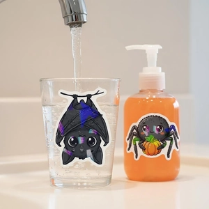 Waterproof holographic Halloween stickers with cute bat and spider on glass surfaces