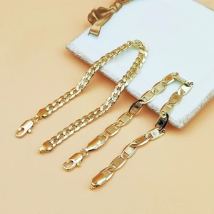 Golden curb and textured anchor chain anklets with lobster clasps for summer beach fashion
