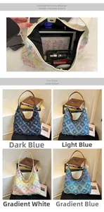 Macro shot of frayed denim tote bag showing distressed star pattern and large inner space