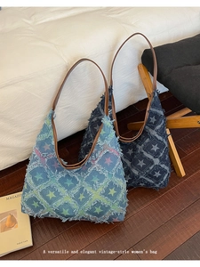 Retro denim tote bags with vintage star pattern and brown leather straps on wood floor
