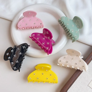 Set of colorful candy-colored rhinestone hair claw clips in varied vibrant shades