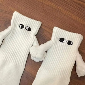 Chaussettes blanches magnétiques qui se tiennent la main avec yeux 3D et coton côtelé