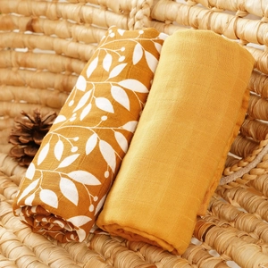 Muslin cotton baby swaddle blanket set in ginger yellow and floral print for newborns