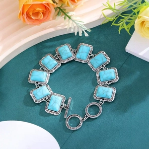 Bohemian vintage silver bracelet with turquoise gemstones and elegant toggle clasp