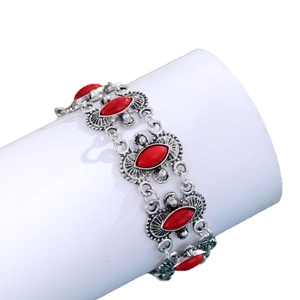 Vintage bohemian silver bracelet featuring marquise red turquoise stones in ethnic style