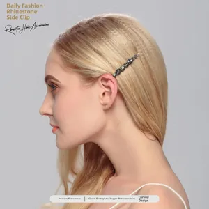 Detail view of crystal rhinestone hair clip with copper base on model's side hair