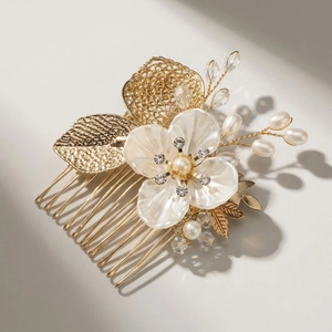 Exquisite gold bridal hair comb with white shell flower, pearls and crystals