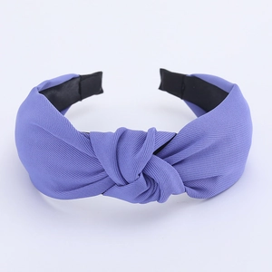 Detailed macro view of lavender ribbed fabric texture and twist knot on wide headband
