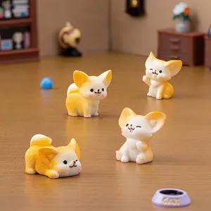 Set of four cute yellow fennec fox resin figurines for micro landscape desk decoration