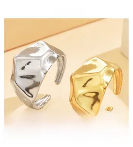 Polished chunky irregular open rings in gold and silver finishes with a modern texture