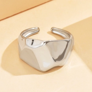 Irregular lava style open ring in silver stainless steel with minimalist industrial design