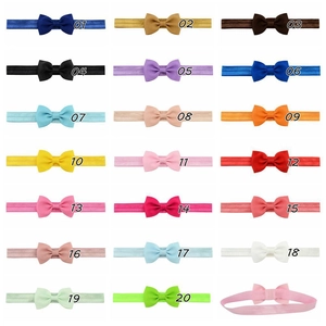 Set of 20 colors elastic nylon bow headbands for baby girls and children with flat lay design