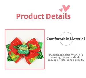 Detail of Christmas bow hair clip with festive tree pattern and green glitter layer