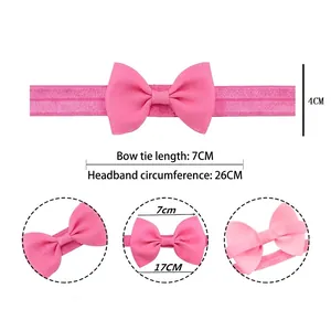 Pink bow elastic nylon baby headband with ribbed texture and 26cm soft stretch circumference