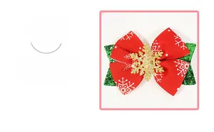 Detail of Christmas bow hair clip with snowflake pattern and glitter texture