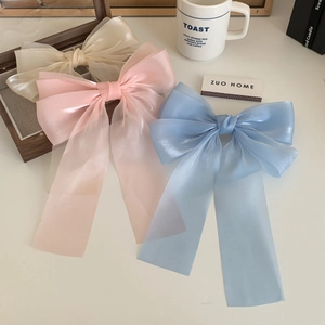 Trois barrettes à nœuds en organza avec longs rubans en crème, rose et bleu ciel pour femme