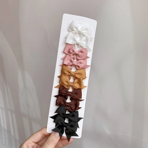Set van 10 effen kleur grosgrain lint strik haarclips voor kinderen op kaart