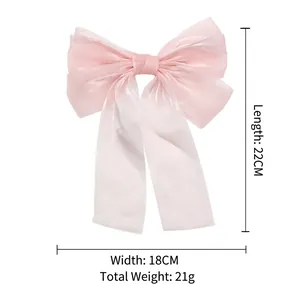 Pince à cheveux nœud rose surdimensionné avec ruban en tulle soyeux 22x18cm femme