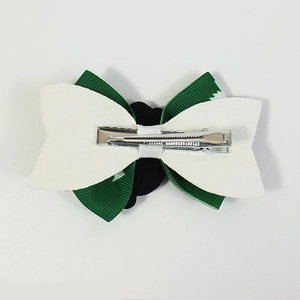 Back view of Christmas sequin bow hair clip with silver metal crocodile clip and green ribbon