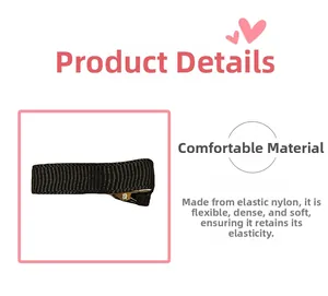 Detail of soft black nylon woven fabric on hair clip showing dense elastic texture