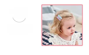 Detail view of light blue and purple fabric wrapped hair clips worn by a young child