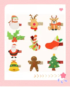 Detailed view of nine Christmas hair clips featuring snowman, reindeer, and tree designs