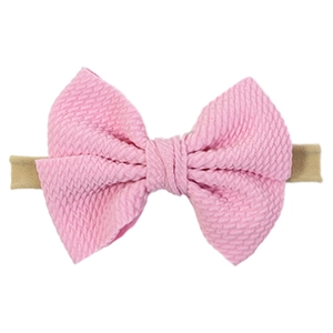 Infant nylon headband with soft pink waffle textured bow for baby girls hair accessory