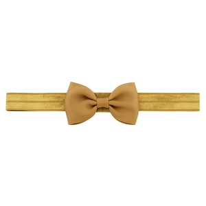 Bandeau élastique en nylon pour filles avec un nœud en gros-grain doré brillant